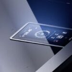 Elica LHOV space-saving design with integrated hood, oven, and induction hob in a modern kitchen.